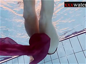 Smoking super-steamy Russian redhead in the pool